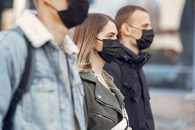 people-masks-stands-street